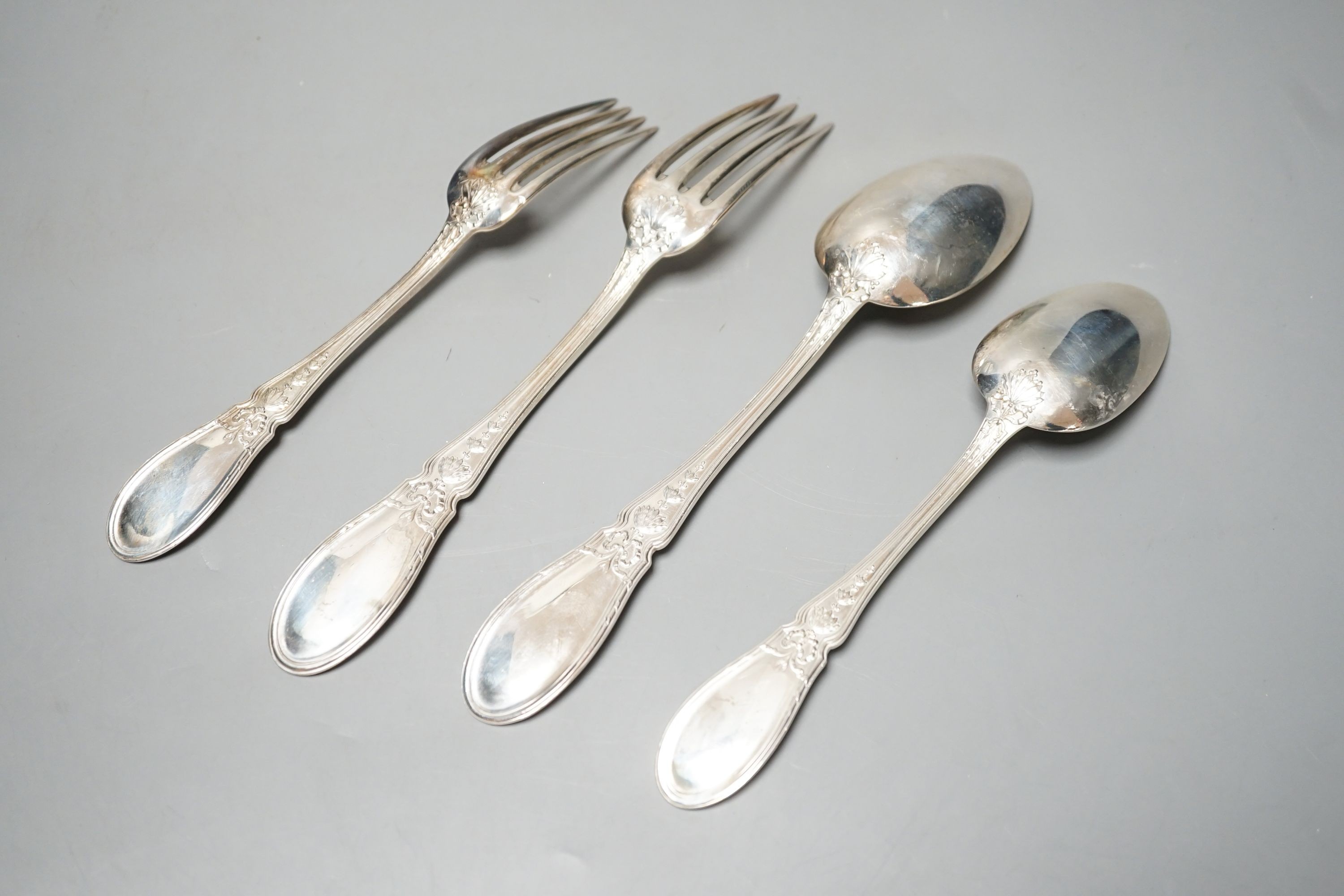 A French 950 standard white metal part canteen of cutlery, comprising fifty nine items, in oak canteen with brass handle, weighable silver 78oz.
